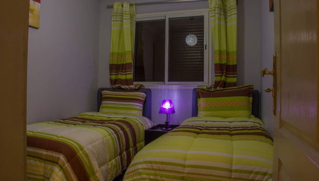 Résidence Issounane 1ère Catégorie - Foto 4, Habitación