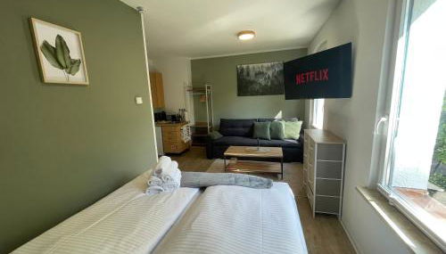Vorstadtoase - 3 Personen - Apartment mit Queensize-Bett, Badewanne, Schlafcouch, Parken, Netflix, Nähe BER - Foto 5