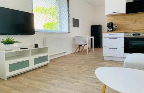 FEDDERSEN LIVING Kernsanierte Ferienwohnungen - Gemütlich - Netflix - Voll ausgestattet - zentral - Foto 17