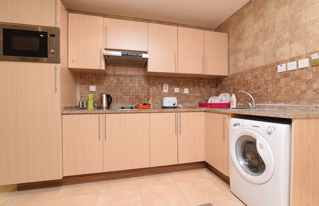 OYO Home 2351BHK Capitol Tower DIC - Photo 22