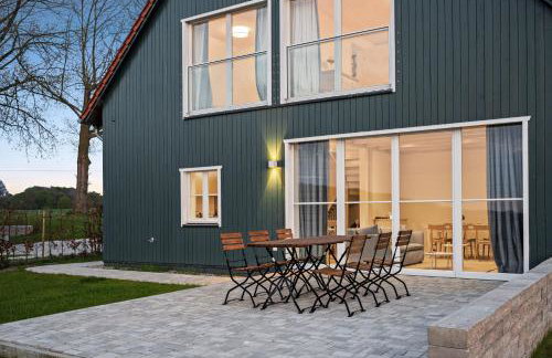 GUT KLETKAMP "Mühlenhof 5" - Ruhige Ferienwohnung mit 3 Schlafzimmern I Terrasse mit See- & Naturblick I Gemeinschaftsgarten I 15 Min zur Ostsee I Küche I Parkplatz I Waschmaschine I WLAN - Foto 27