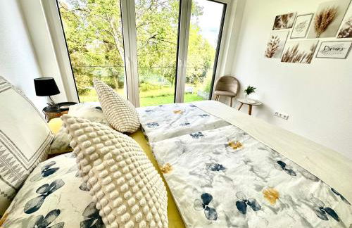 Apartment auf zwei Ebenen mit Aussicht ins Grüne - Foto 18