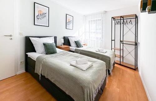 Moderne 3-Zimmer-Wohnung im Zentrum- Tiefgarage inklusive, Smart-TV, Shopping & Sightseeing ums Eck - Foto 13