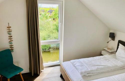 Familienhaus an der Nordsee - Sauna - Kamin - Südterrasse direkt über dem Wasser - Foto 17