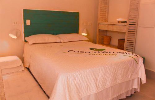 Casa d'Aroeira Residencial Boutique - Centro de Juqueí - Perto de Tudo - 2 quadras do Mar - Serviço de Praia - Roupa de Cama 600 fios algodão Egípcio - Tudo Novo - Estacionamento Interno - Cozinha - Consulte unidades com Ofurô Hidro e Cromoterapia - Foto 36
