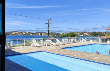 TOP 1 QUARTO com ESTACIONAMENTO em Condomínio com VISTA INCRIVEL - PORTARIA 24h, PISCINA, Sauna e Parquinho Infantil - Apartamento com Ar condicionado, Smart TV, Wi-Fi, Cozinha Completa, NETFLIX, Entre o MAR e a LAGOA, CUSTO BENEFICIO - Foto 1