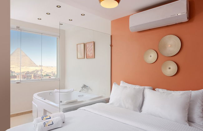 Xuru Stays I Jacuzzi Studios @ The Pyramids - Foto 5