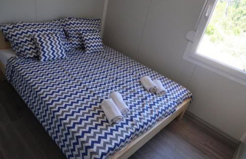 Robinson olive tree huts - Photo 12