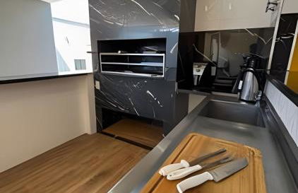 Casa com piscina, área gourmet e espaço p/ festas - Foto 28