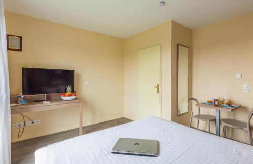 Zenitude Hôtel - Résidences Magny les Hameaux - Foto 22