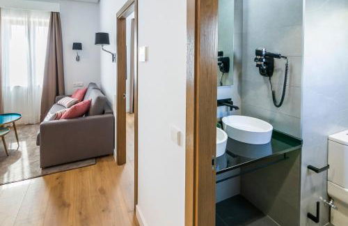 Aquitania Home Suites - Photo 31