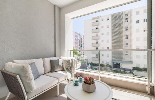 Boutique Soft Tones with Balcony and Secured Garage - Photo 5