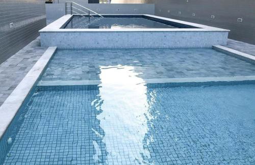 Apartamento Aconchegante e Elegante com Ar-Condicionado, Piscina, Garagem e Varanda Gourmet a 3 min da Praia - Photo 29