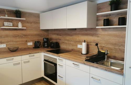 FeWo "Waldblick" und "Gartenblick" mit Pool und Kinderspielplatz - Foto 12