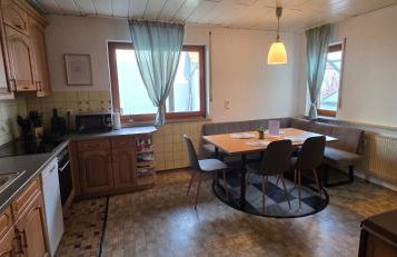 Gemütliches Ferienhaus in Schnaid mit zwei separaten und geräumigen Wohnungen - ausgestattet mit je einer großen Küche, zwei Schlafzimmern und einem Badezimmer - Foto 11