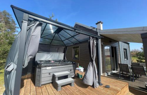 Osada Skoczkowo komfortowe domki z prywatnymi wannami hot-tub nad jeziorem- sauna- balia- prywatny staw wędkarski - Foto 13