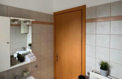 Sunny Modern Beach Retreat Steps from the Shore - Photo 15