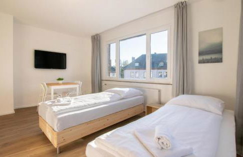 T&K Apartments - Studio Apartments - 22 min MESSE DUS & Airport DUS - Foto 3