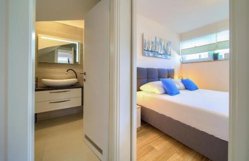 VILLA SOLIS LACUS modernes Apartment - privater beheizbarer Pool- Klimaanlage - private Parkplätze - Foto 27