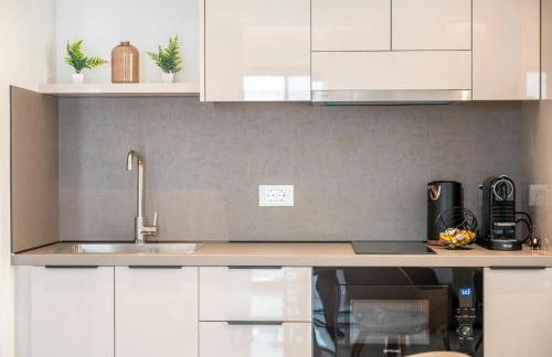 Unicos City Suites - Photo 33