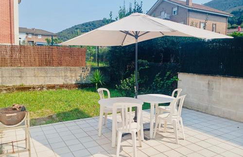 Familiar bajo con jardín en Gibaja - Foto 1