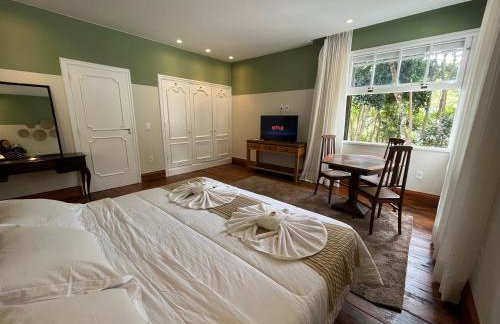 Casa 13 Floresta Boa Vista - Casa Espetacular com 6 Quartos e Arquitetura Única - Photo 2