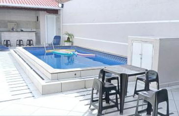 "Lindíssima Casa Pé na Areia com Opção da Piscina Aquecida Cobrado a Parte, Sala de Jantar, 3 Amplos Quartos, Sendo1Suíte, Amplo Espaço de Lazer com Área Gourmet em Deck Coberto com Churrasqueira e Mesa de Bilhar Frente a Piscina, Super Pertinho da Praia" - Photo 8