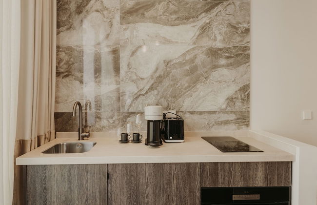 Comfy Studios Hotel - Photo 31