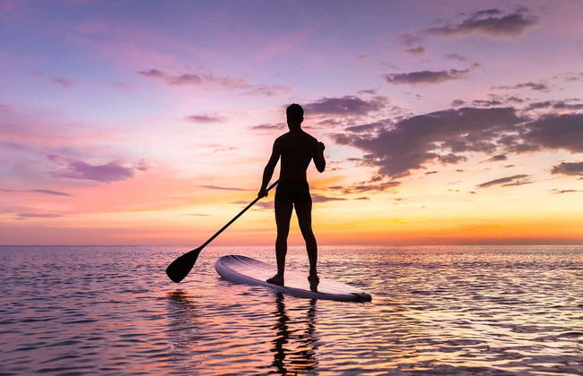 Paddle surf ao entardecer - Foto 1