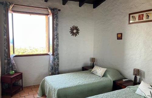 Villa A Scopa à Lumio en Corse avec piscine chauffée, vue mer panoramique, climatisation, jardin arboré de 3000m2, 10 pers, 5 Chb, 4 Sdb - Foto 21