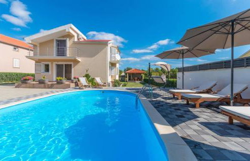 Four-Bedroom Holiday Home In Pristeg - Photo 1