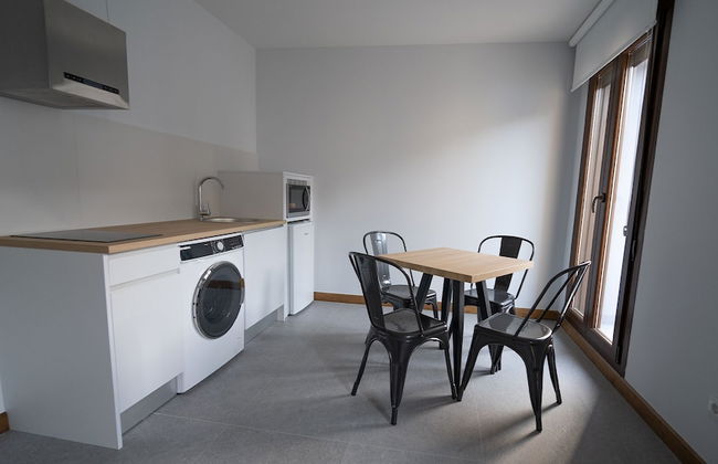 Apartamentos Puerta de Occidente - Photo 7