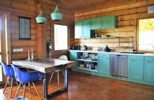 Norwegisches Blockhaus mit Gartensauna - Foto 1