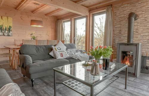 traumHaff Küstenchalets - einzigartige Chalets an der Ostsee. Ganz aus Lärchenholz mit Kamin und Sauna - Foto 10