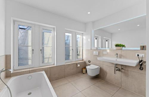 Iller Homes Memmingen - Moderne Fewos mit Terrasse für bis zu 7 Pers mit Parkplätzen - Foto 17