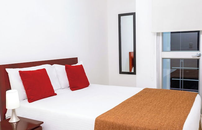 122 Plaza Apartahotel - Photo 18