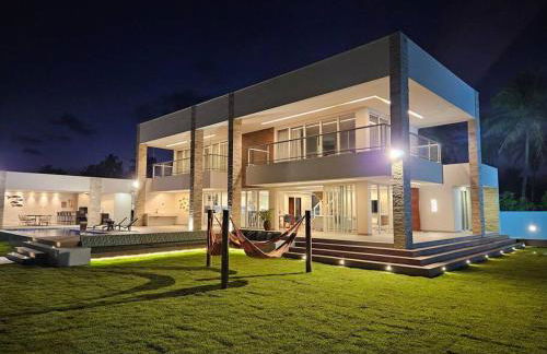 Piscina aquecida, 5 suítes e pé na areia com vista espetacular!! - Photo 20