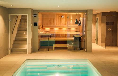 Dreamapartment La Vigna "White Suite" mit eigenem Indoorpool, Sauna & Grillhütte - Foto 1