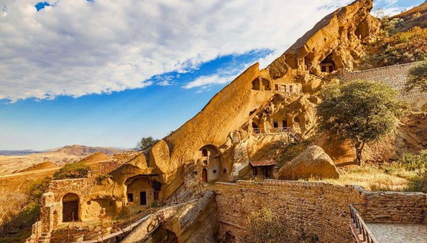 Small rooms carved into rock