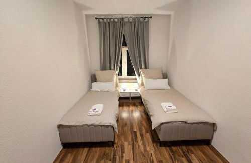 Boardinghouse mit 10 großen Apartments mit Parkplatz und Balkon - Photo 42