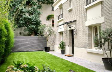 Montmartre en rez-de-jardin - Foto 1