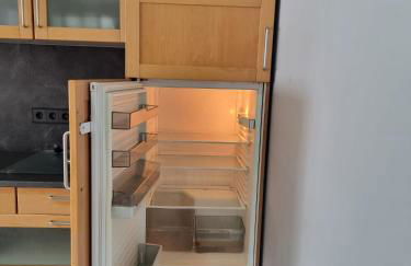 Gemütliche Ferienwohnung mit 1 Schlafzimmer, Wohnzimmer mit Schlafcouch & voll ausgestattete Küche - Foto 13