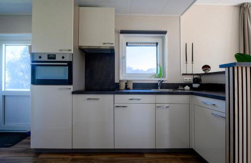 Modernes Chalet New Port 067 mitten im Grünen mit eigener Terrasse am Wasser Nr 67 - Foto 7