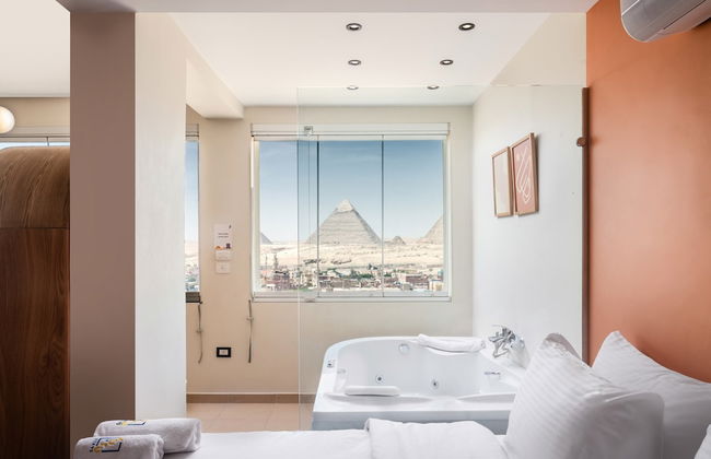 Xuru Stays I Jacuzzi Studios @ The Pyramids - Foto 4