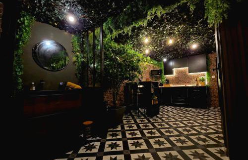 Love room avec spa privatif et salle de jeux adultes - Foto 8