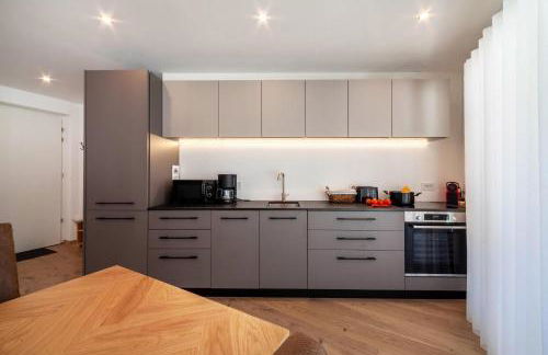 Adler Living Attika Wohnung - Foto 12