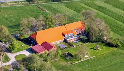 Ostfrieschen Ferienwohnung & Spielscheune - Foto 3, Garden