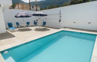 Casa Espaçosa com 5 Quartos Piscina Privativa 300m da Praia Ar condicionado em todos cômodos - Foto 3