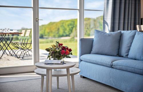 GUT KLETKAMP "Mühlenhof 5" - Ruhige Ferienwohnung mit 3 Schlafzimmern I Terrasse mit See- & Naturblick I Gemeinschaftsgarten I 15 Min zur Ostsee I Küche I Parkplatz I Waschmaschine I WLAN - Foto 14