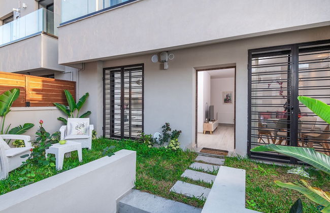 Le Rez De Jardin - Photo 1